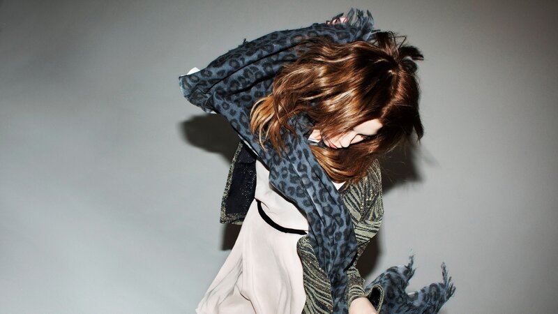 woman with leopard scarf