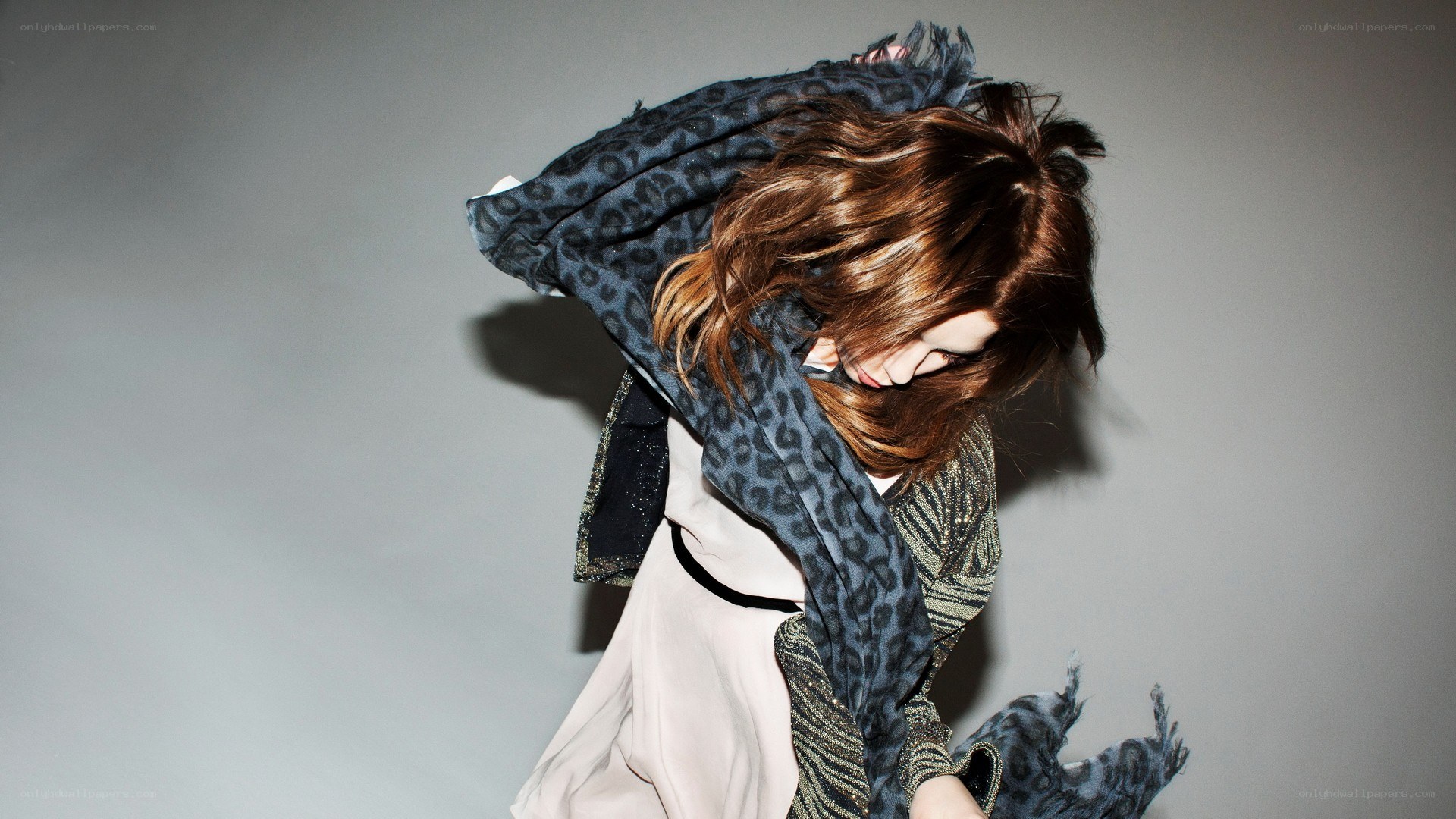 woman with leopard scarf
