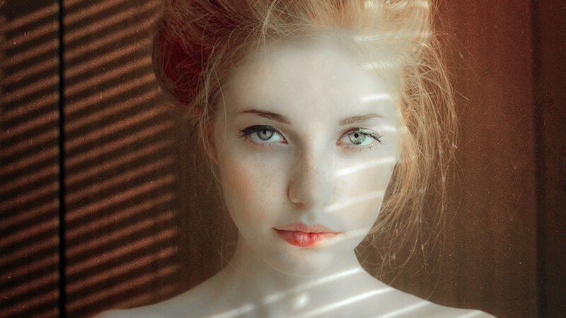 woman with light hair in sunlight