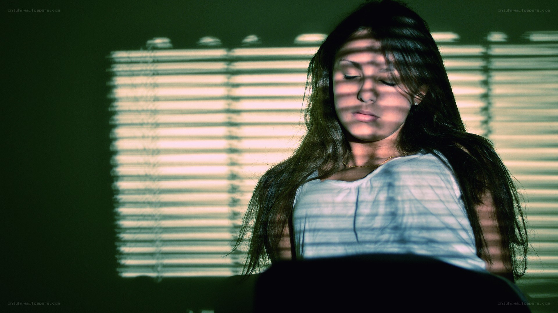 woman with light on face
