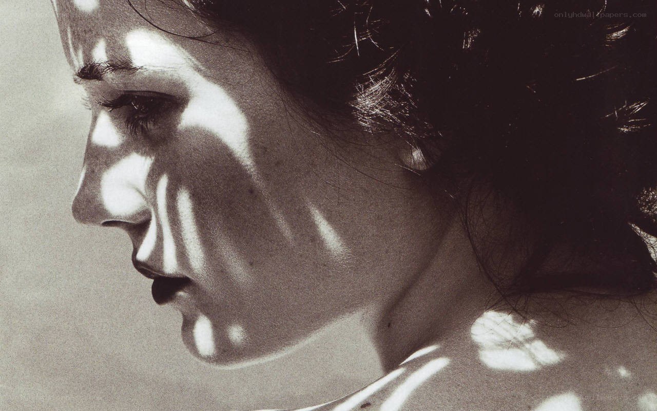 woman with light patterns on face