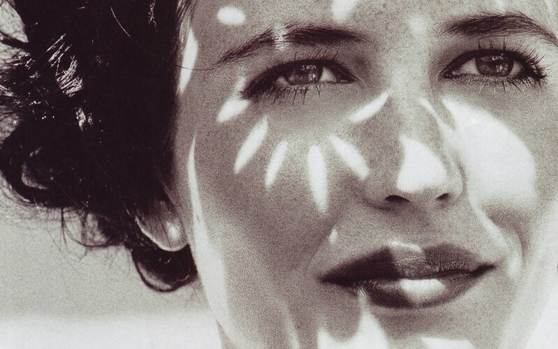woman with light patterns on face