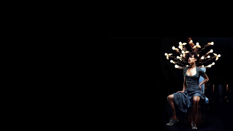 Woman with Light Sculpture — Black