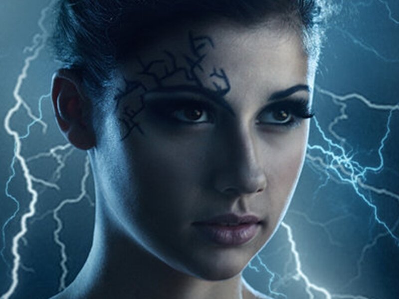 woman with lightning tattoos