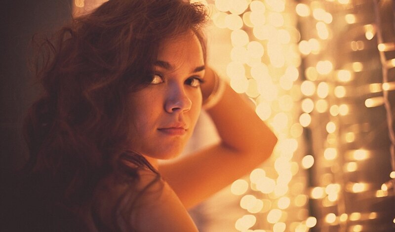 woman with lights in background