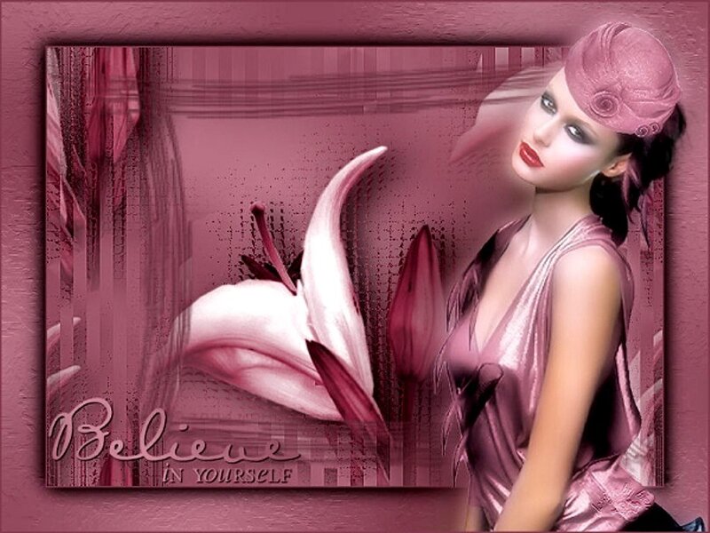 woman with lily and pink hat