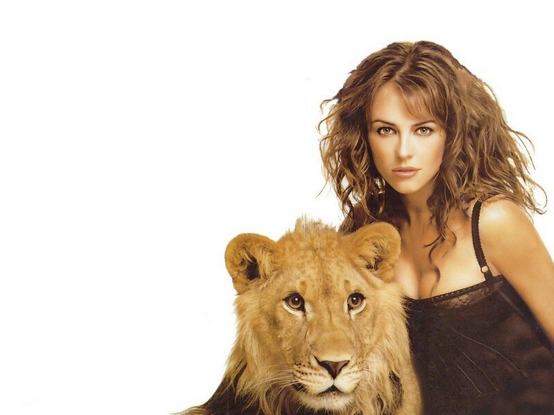 woman with lion cub