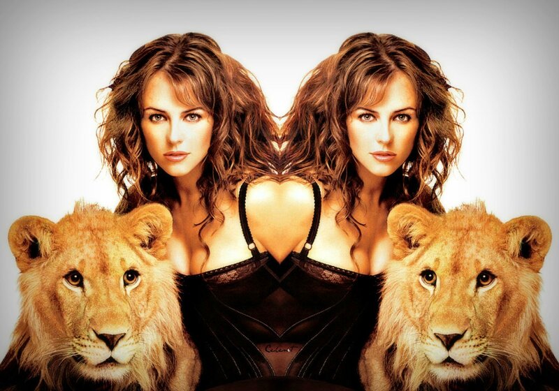 Woman with Lion Cubs — Brown