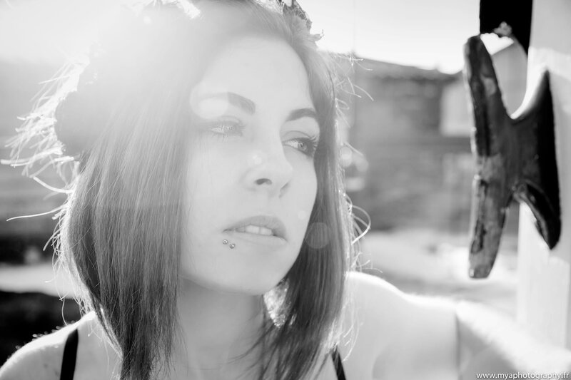 woman with lip piercing in sunlight