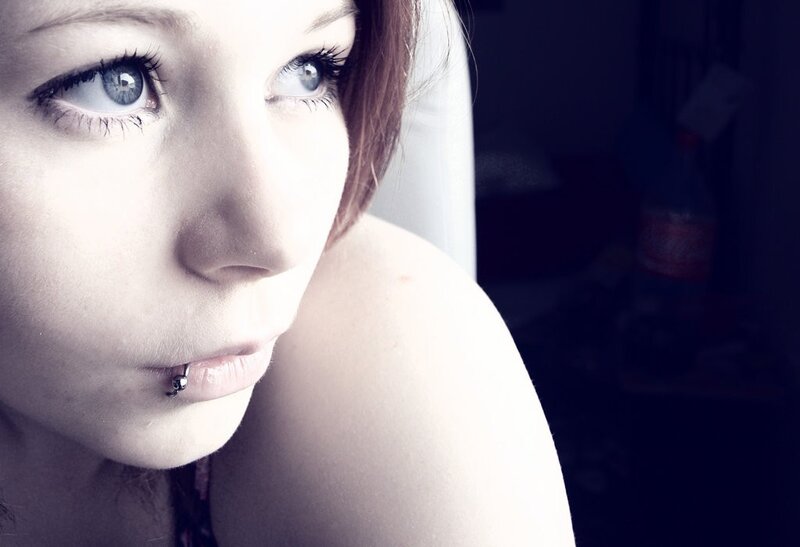 Woman with Lip Piercing — White, Dramatic