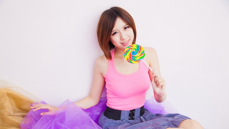 Woman with lollipop