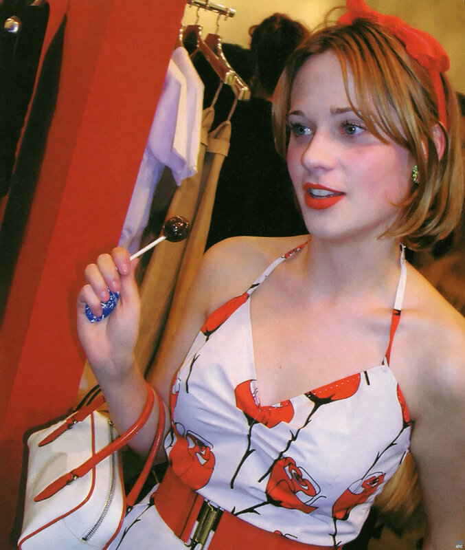 Woman with lollipop in dressing room