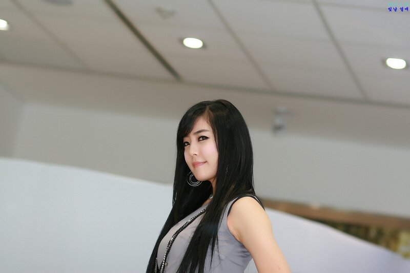 Woman with Long Black Hair — Gray, Neutral, Photograph