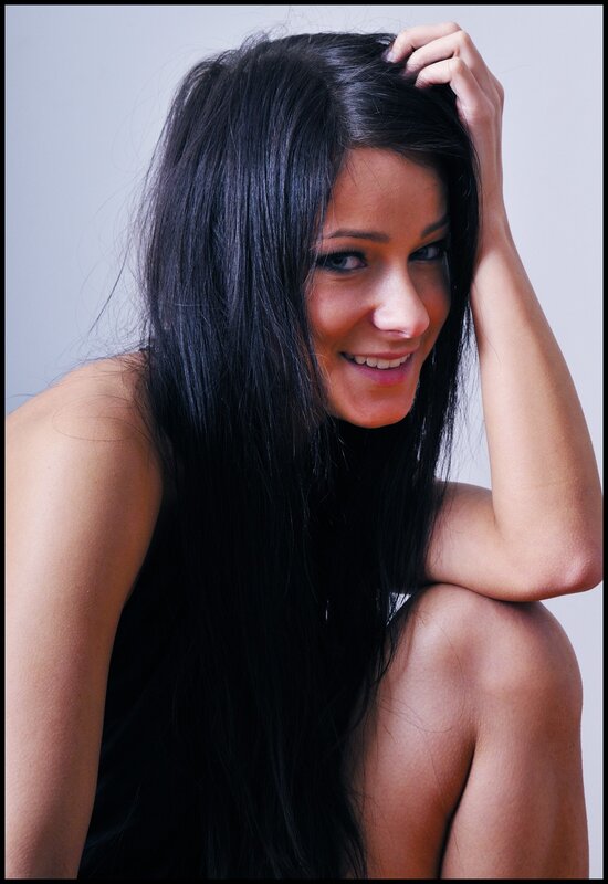 Woman with Long Black Hair — Neutral, Photograph, Hand