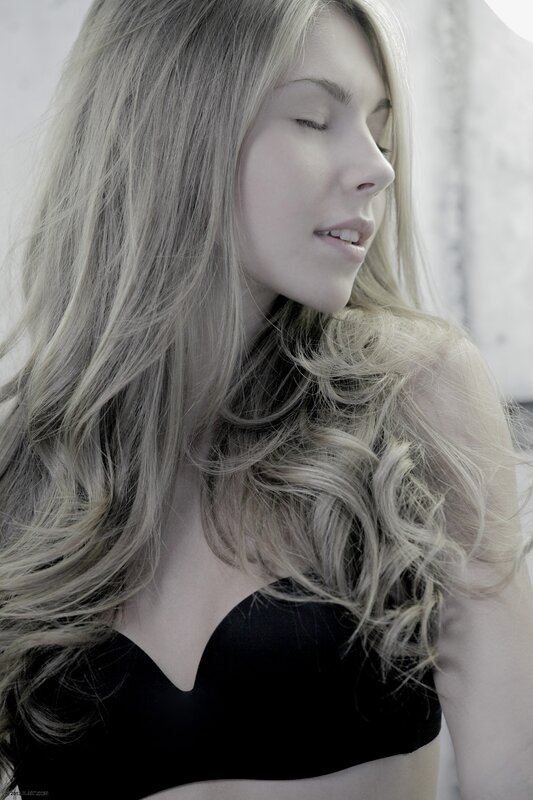 Woman with Long Blonde Hair — Black, Serene