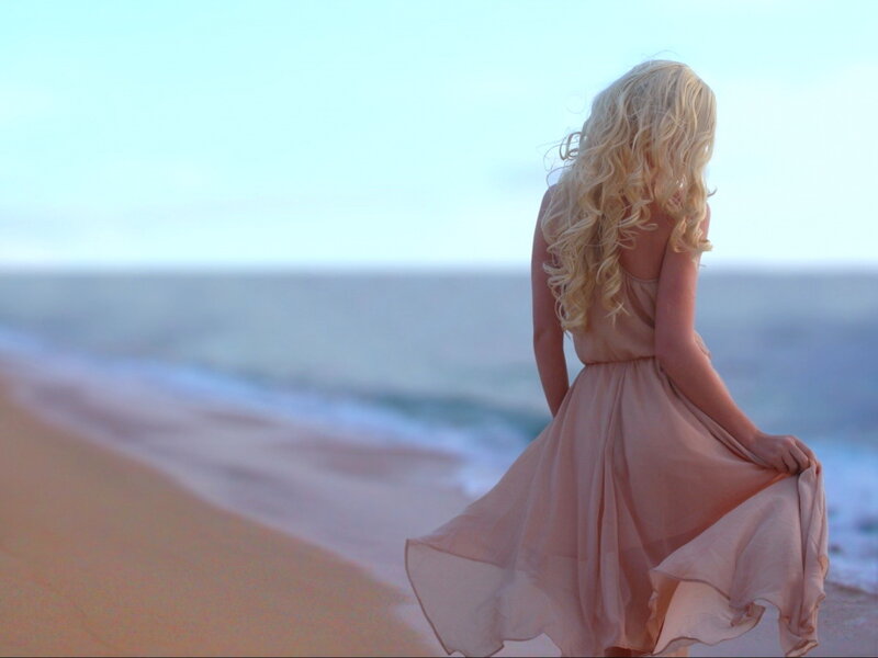 Woman with Long Blonde Hair — Blue, Serene, Sunset