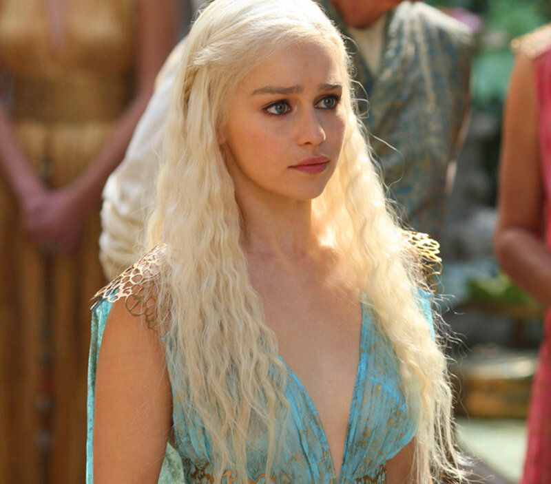 Woman with Long Blonde Hair — Blue, Serious