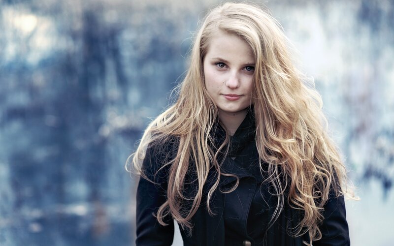 Woman with Long Blonde Hair — Blue, Serious, Winter