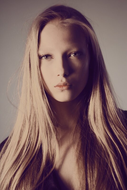 Woman with Long Blonde Hair — Brown, Dramatic, Photograph, Face