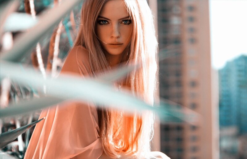 Woman with Long Blonde Hair — Orange, Dramatic