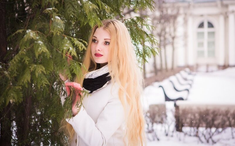 Woman with Long Blonde Hair — White, Serene, Winter
