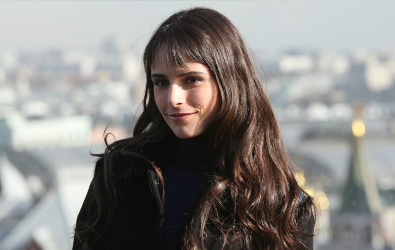 Woman with Long Brown Hair — Calm, Afternoon, Photograph, Cityscape, Buildings