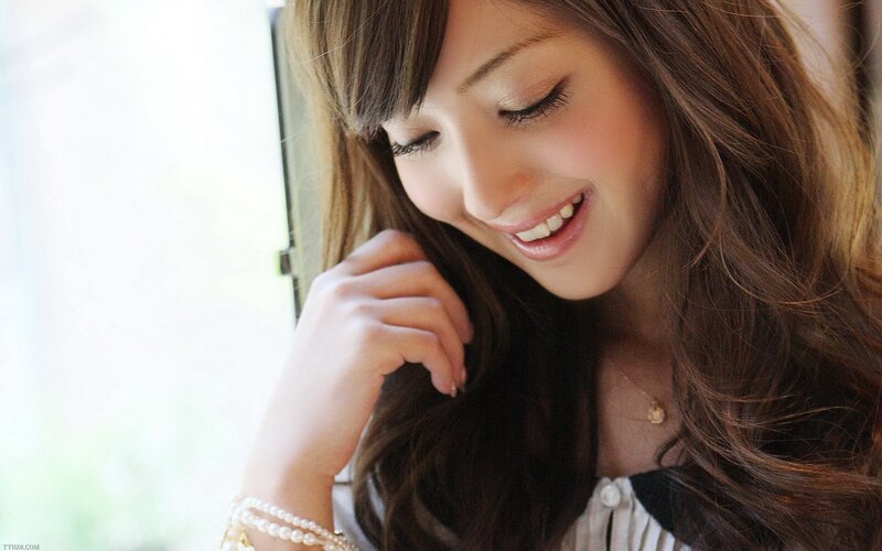 Woman with Long Brown Hair — Calm, Afternoon, Photograph, Pearl Bracelet, Necklace