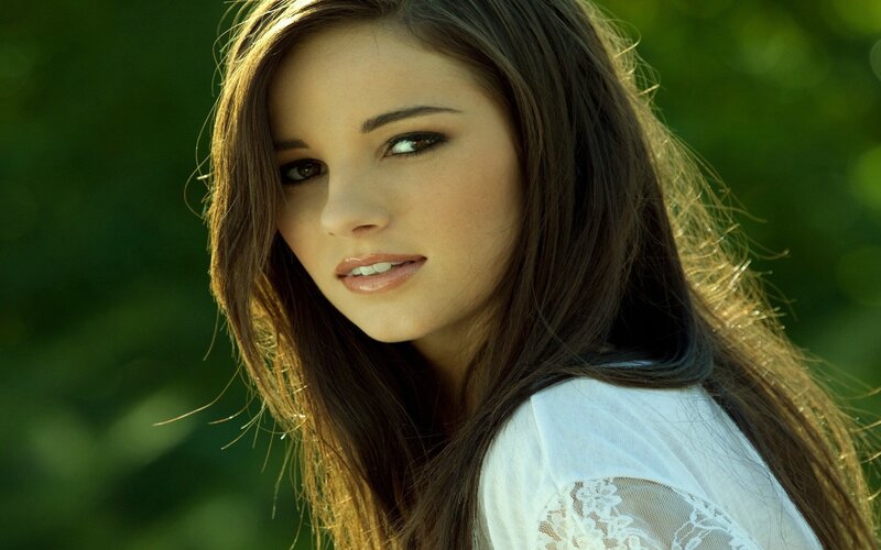 Woman with Long Brown Hair — Calm, Afternoon, Photograph, White Shirt, Green Background