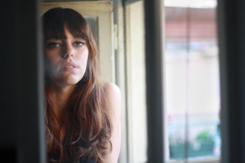 Woman with Long Brown Hair — Contemplative, Afternoon, Photograph, Window