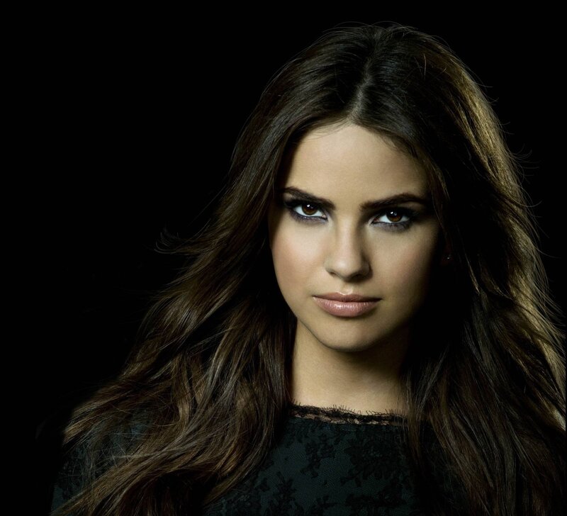 Woman with Long Brown Hair — Dramatic, Dark Background