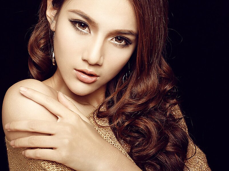 Woman with Long Brown Hair — Dramatic, Photograph, Earring, Gold Top