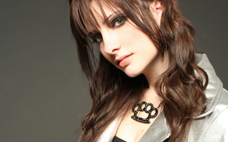 Woman with Long Brown Hair — Dramatic, Photograph, Necklace, Silver Jacket