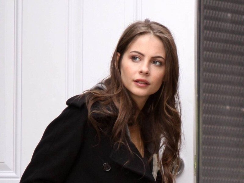 Woman with Long Brown Hair — Neutral, Photograph, Coat