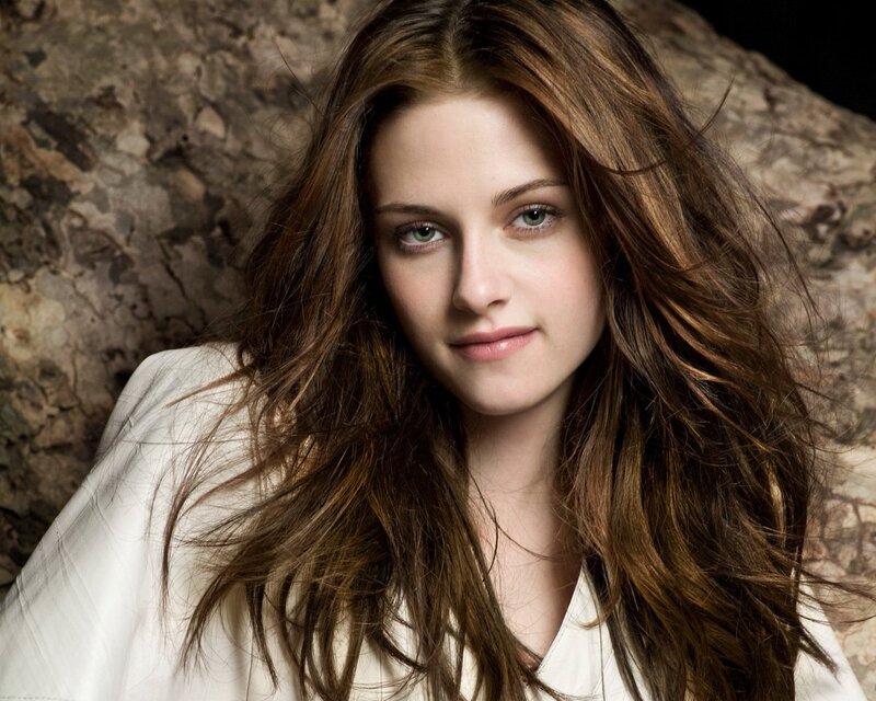 Woman with Long Brown Hair — Neutral, Photograph, White Shirt, Stone Wall, Beige, Green