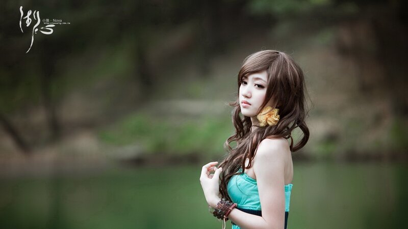 Woman with Long Brown Hair — Serene, Photograph, Flower Earring