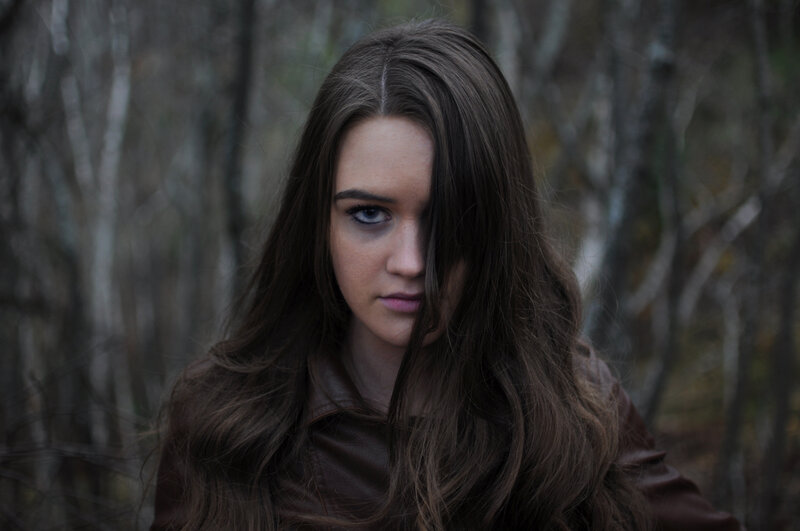 Woman with Long Brown Hair — Serious, Photograph, Forest