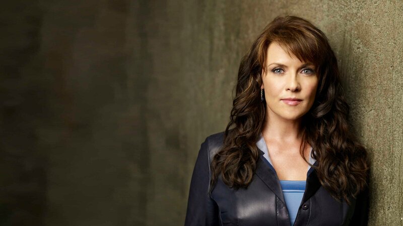 Woman with Long Brown Hair — Serious, Photograph, Wall, Jacket