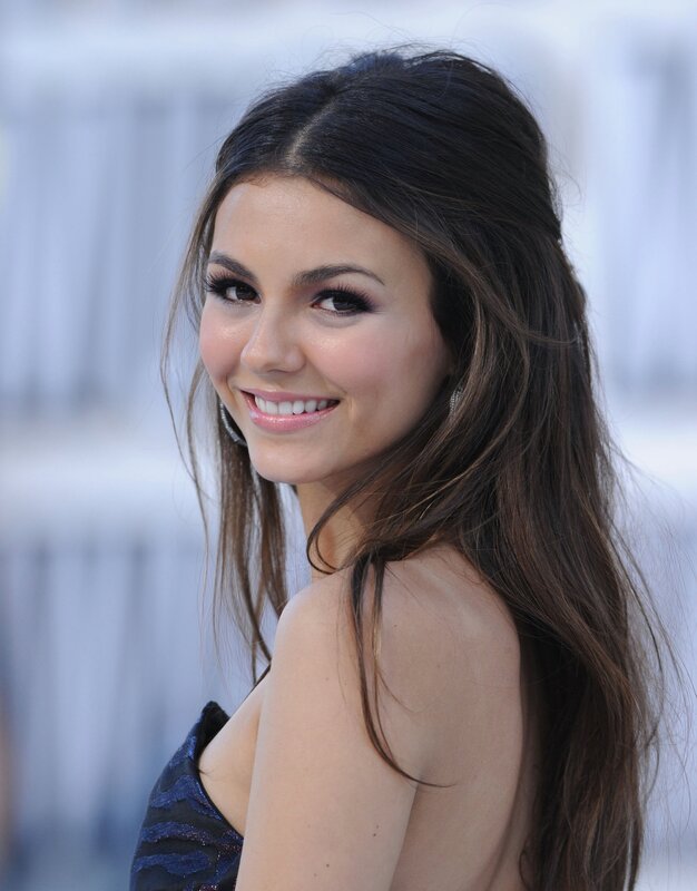 woman with long brown hair smiling