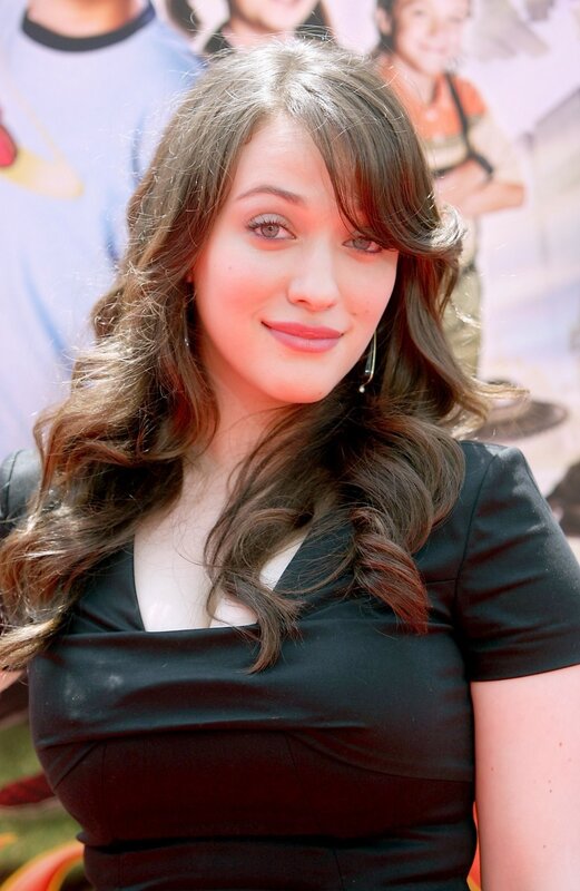 woman with long brown hair smiling