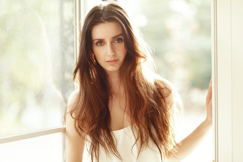 Woman with Long Brown Hair — White, Serene, Afternoon