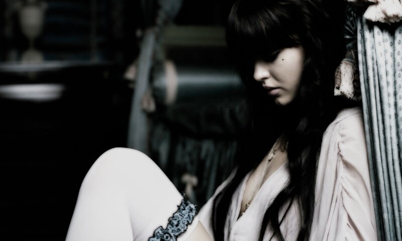 Woman with Long Dark Hair — Black, Dramatic, Photograph, Curtain