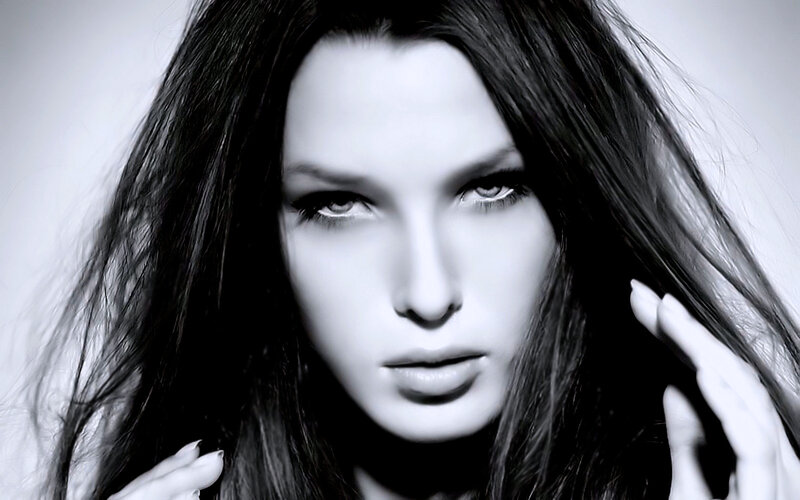 Woman with Long Dark Hair — Black, Dramatic, Photograph, Hand, Eyes