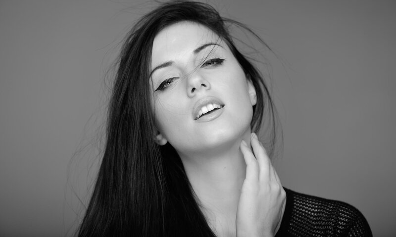 Woman with Long Dark Hair — Black, Dramatic, Photograph, Hand, Neck