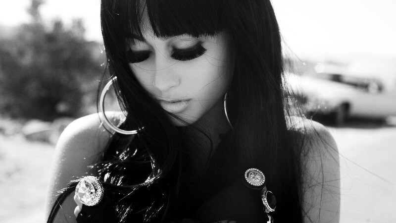 Woman with Long Dark Hair — Black, Dramatic, Photograph, Hoop Earrings, Long Eyelashes