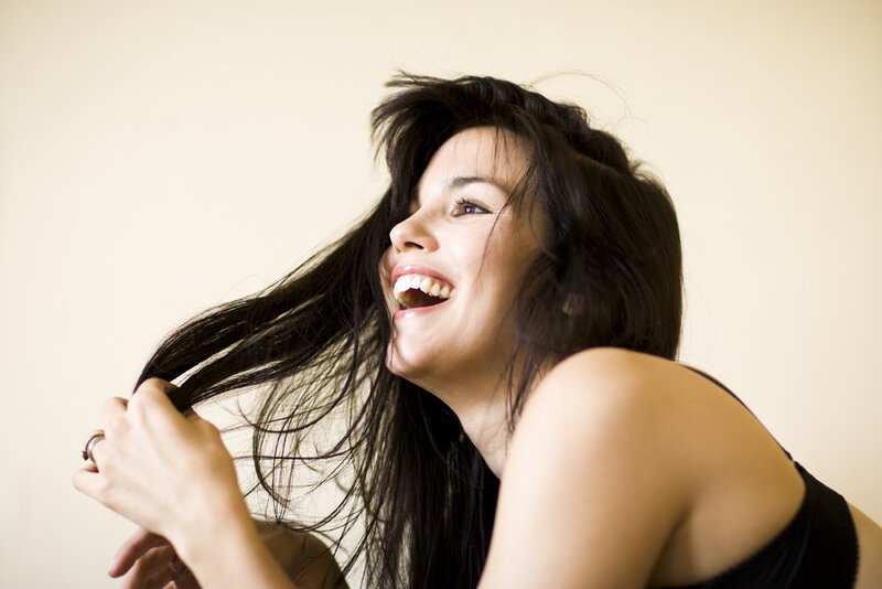 Woman with Long Dark Hair — Black, Joyful, Photograph
