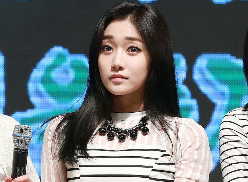 Woman with Long Dark Hair — Black, Neutral, Photograph, Microphone