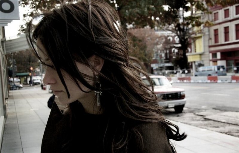 Woman with Long Dark Hair — Brown, Somber