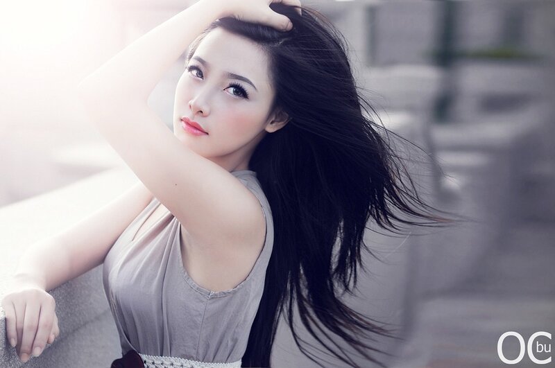 Woman with Long Dark Hair — Gray, Serene