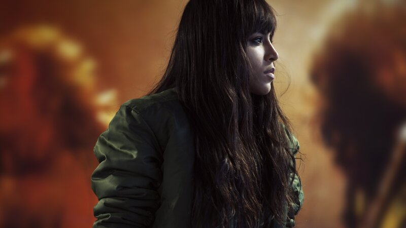 Woman with Long Dark Hair — Green, Dramatic, Photograph, Jacket
