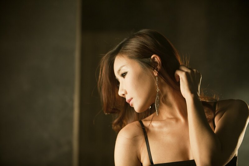 woman with long earrings